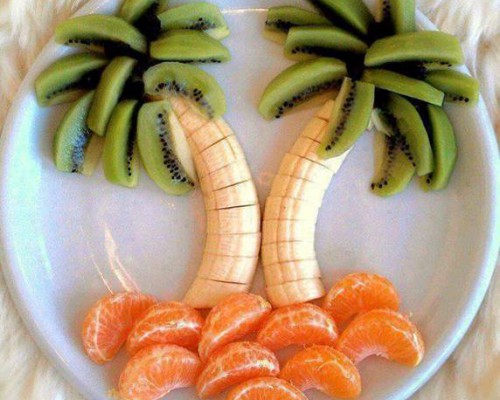 Palmbomen van bananen, kiwi's en mandarijn