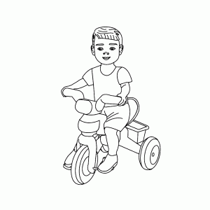 Jongetje rijdt op zijn driewieler