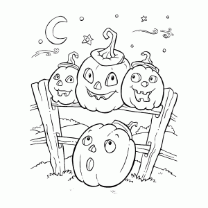 Some merry Halloween pumpkins on a fence